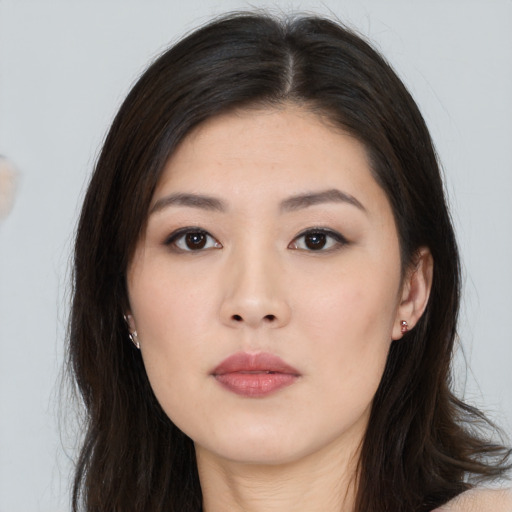 Neutral asian young-adult female with long  brown hair and brown eyes