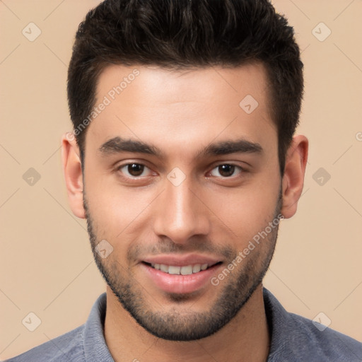 Joyful white young-adult male with short  brown hair and brown eyes