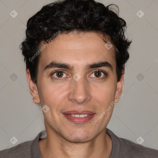 Joyful white young-adult male with short  black hair and brown eyes