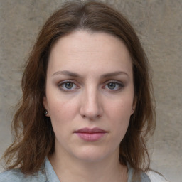 Neutral white young-adult female with medium  brown hair and grey eyes