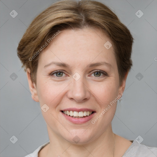 Joyful white young-adult female with short  brown hair and grey eyes