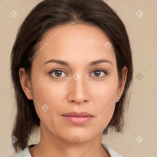 Neutral white young-adult female with medium  brown hair and brown eyes