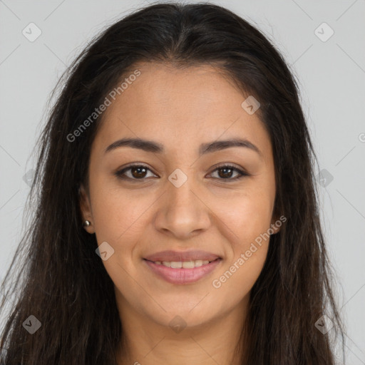 Joyful latino young-adult female with long  brown hair and brown eyes