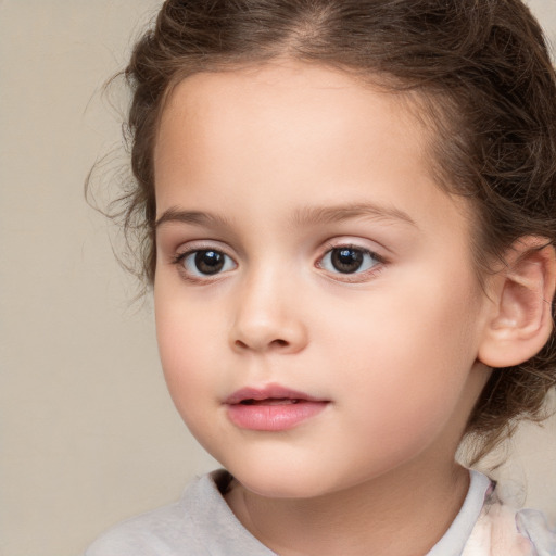 Neutral white child female with medium  brown hair and brown eyes