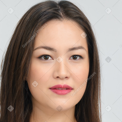 Joyful asian young-adult female with long  brown hair and brown eyes