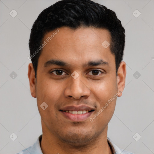 Joyful latino young-adult male with short  black hair and brown eyes