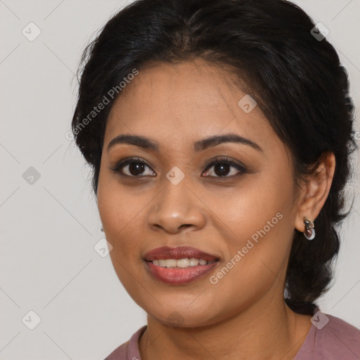 Joyful latino young-adult female with medium  brown hair and brown eyes