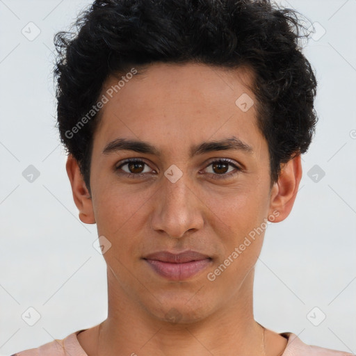 Joyful latino young-adult male with short  brown hair and brown eyes