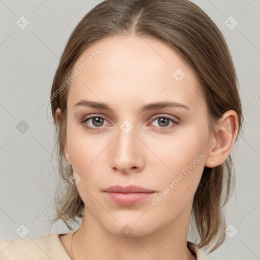 Neutral white young-adult female with medium  brown hair and brown eyes