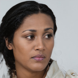 Neutral black young-adult female with medium  brown hair and brown eyes