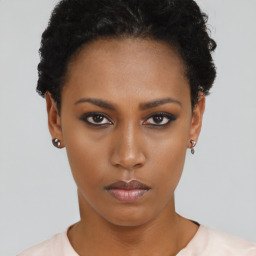 Neutral black young-adult female with short  black hair and brown eyes