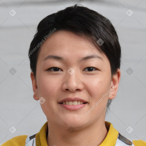 Joyful asian young-adult female with short  brown hair and brown eyes