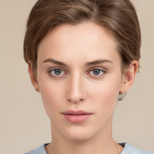 Neutral white young-adult female with short  brown hair and brown eyes