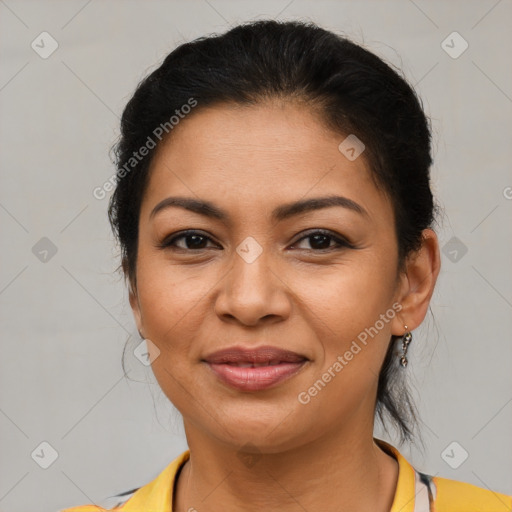 Joyful latino young-adult female with medium  brown hair and brown eyes