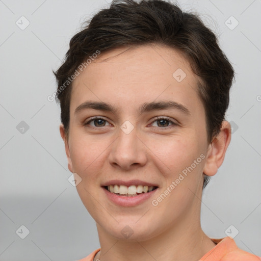 Joyful white young-adult female with short  brown hair and brown eyes