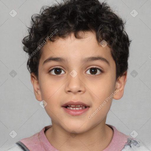 Joyful white child male with short  brown hair and brown eyes