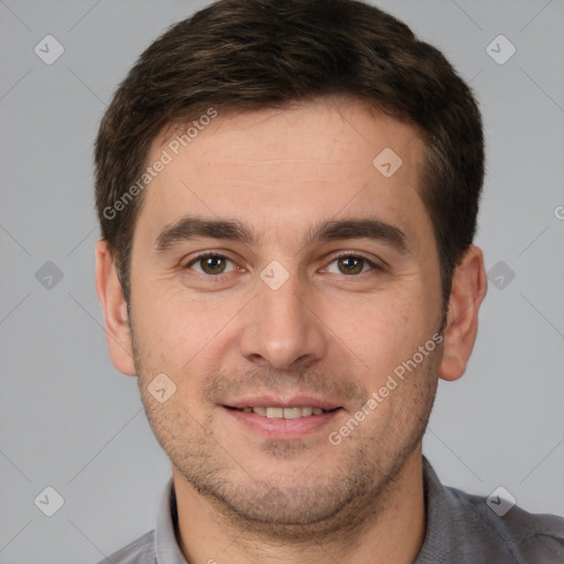 Joyful white young-adult male with short  brown hair and brown eyes