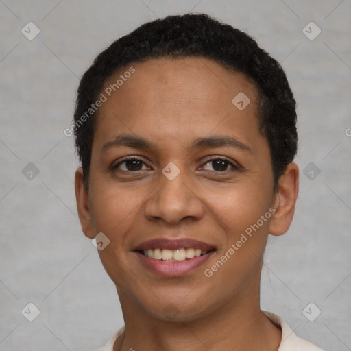 Joyful latino young-adult female with short  black hair and brown eyes