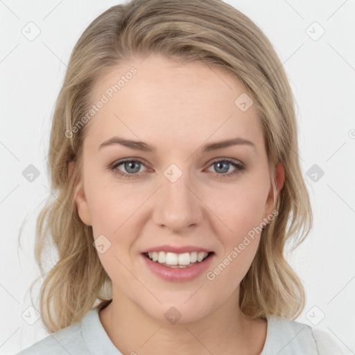 Joyful white young-adult female with medium  brown hair and green eyes