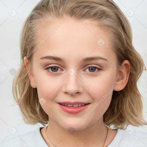 Joyful white child female with medium  brown hair and blue eyes