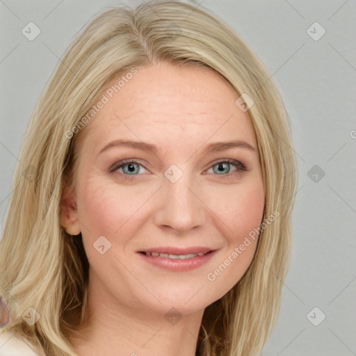 Joyful white young-adult female with long  brown hair and blue eyes