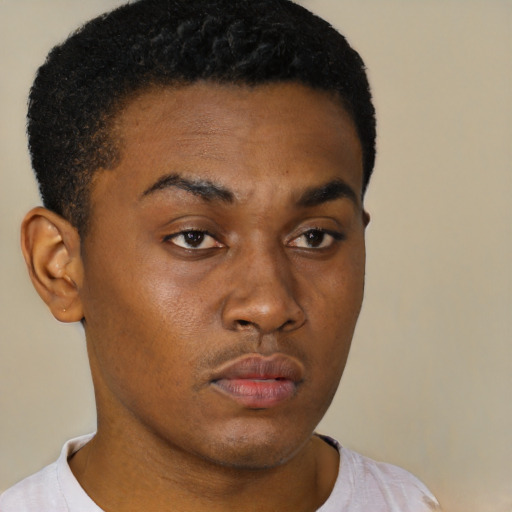 Neutral black young-adult male with short  brown hair and brown eyes