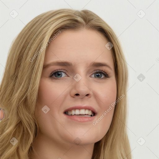 Joyful white young-adult female with long  brown hair and blue eyes