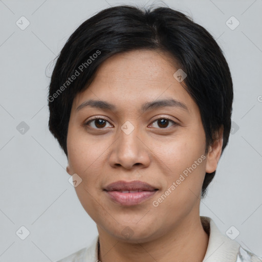 Joyful asian young-adult female with short  black hair and brown eyes