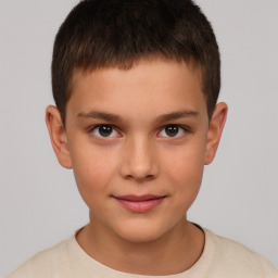 Joyful white child male with short  brown hair and brown eyes