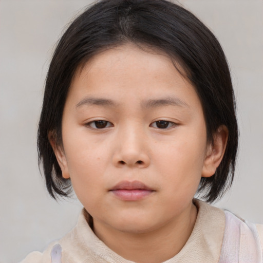 Neutral asian child female with medium  brown hair and brown eyes