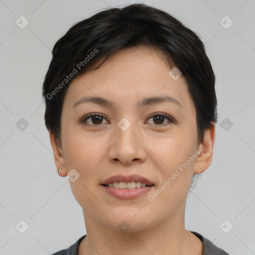 Joyful asian young-adult female with short  black hair and brown eyes