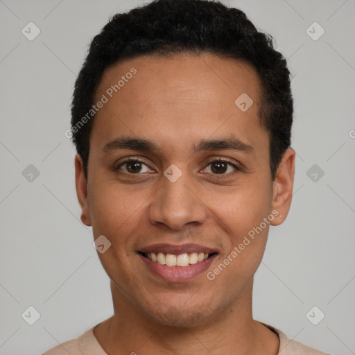 Joyful latino young-adult male with short  black hair and brown eyes