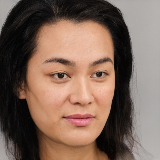 Joyful asian young-adult female with medium  brown hair and brown eyes