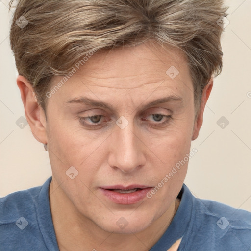 Joyful white adult male with short  brown hair and grey eyes