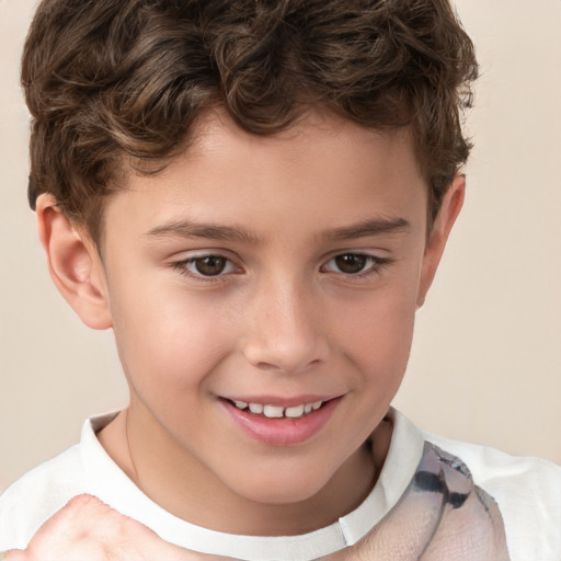 Joyful white child male with short  brown hair and brown eyes