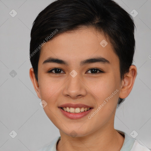 Joyful asian young-adult female with short  brown hair and brown eyes