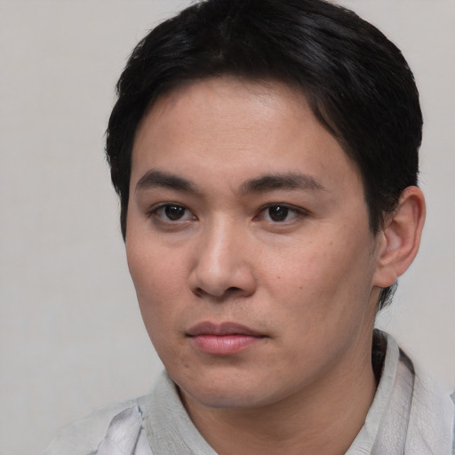 Neutral asian young-adult male with short  brown hair and brown eyes