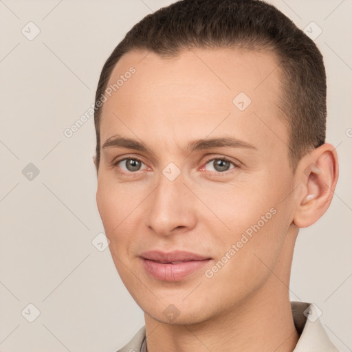 Joyful white young-adult male with short  brown hair and brown eyes