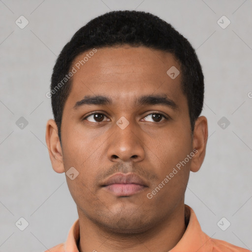 Neutral latino young-adult male with short  black hair and brown eyes