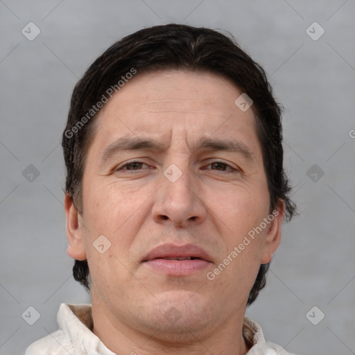 Neutral white adult male with short  brown hair and brown eyes