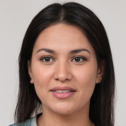 Joyful white young-adult female with medium  brown hair and brown eyes