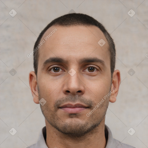 Neutral white young-adult male with short  black hair and brown eyes