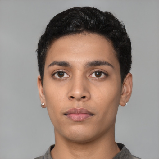 Neutral latino young-adult male with short  black hair and brown eyes