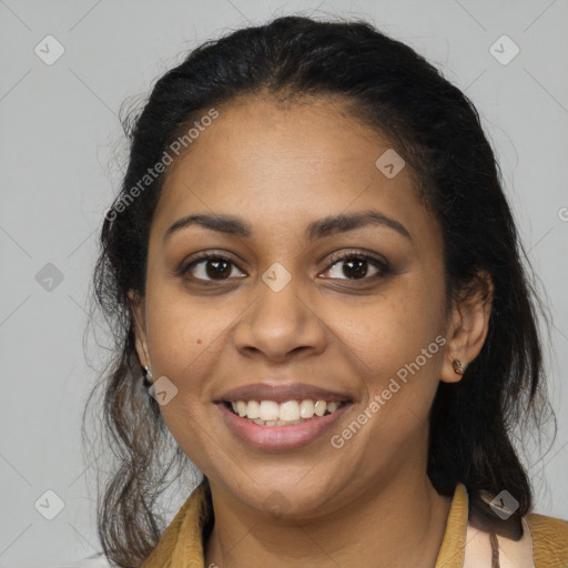 Joyful latino young-adult female with long  brown hair and brown eyes