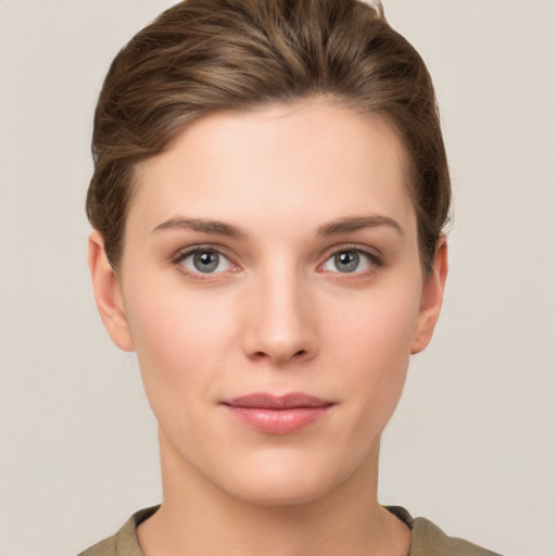 Neutral white young-adult female with short  brown hair and grey eyes