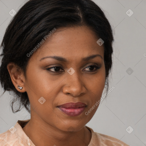 Joyful black young-adult female with medium  brown hair and brown eyes