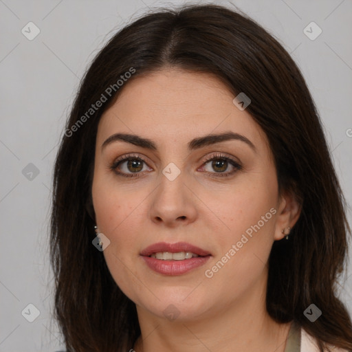 Joyful white young-adult female with long  brown hair and brown eyes