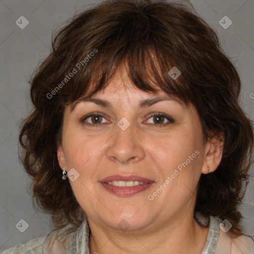 Joyful white adult female with medium  brown hair and brown eyes