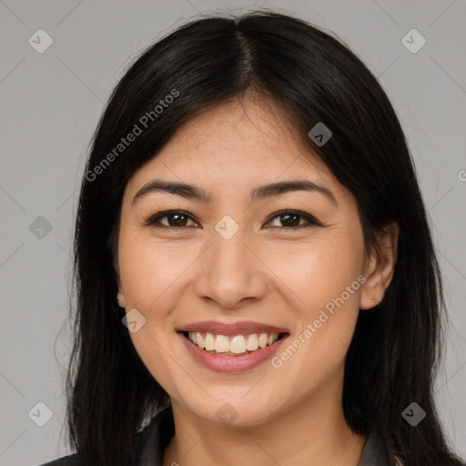 Joyful asian young-adult female with long  brown hair and brown eyes