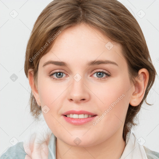 Joyful white young-adult female with medium  brown hair and blue eyes